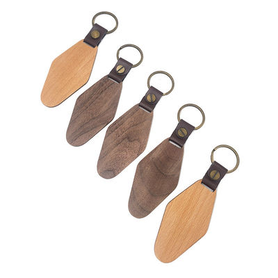 La catena chiave di legno su misura 14g del rombo ha personalizzato la noce incisa di Watel