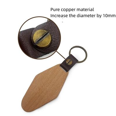 La catena chiave di legno su misura 14g del rombo ha personalizzato la noce incisa di Watel