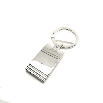 Pacchetto polibag individuale per porta chiavi in metallo resistente con finitura in argento