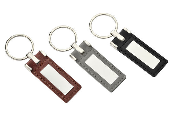 Incidere di cuoio su ordinazione promozionale dell'anello portachiavi ha personalizzato Logo Zinc Alloy Material