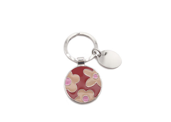 Prezzo buono Portiere su ordinazione sveglio del materiale da otturazione di colore della catena chiave del metallo del modello di fiore in linea