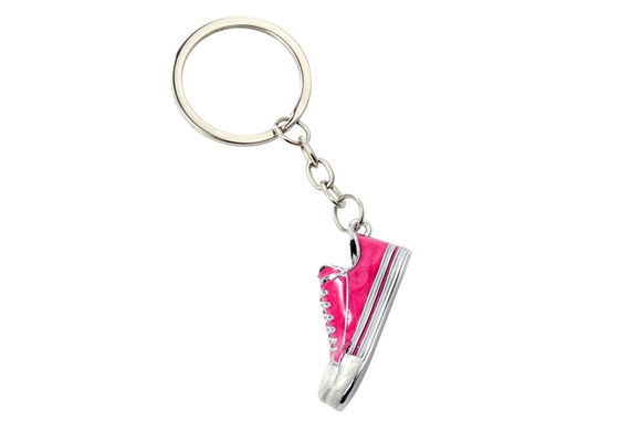 Prezzo buono Il pattino calza il materiale in lega di zinco di riempimento sveglio del portiere della catena chiave del metallo in linea