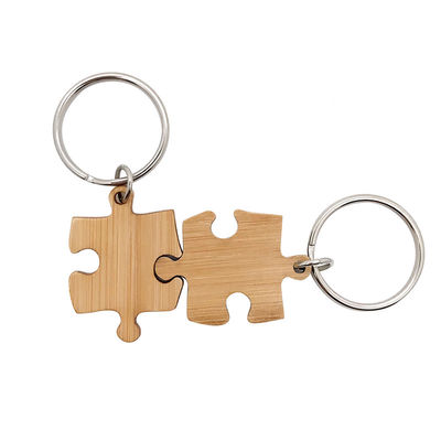 Prezzo buono Catena chiave di corrispondenza di legno di bambù di puzzle che incide stampa UV in linea