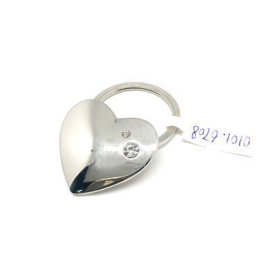 Prezzo buono Logo in rilievo Bella chiave di metallo Charm / Carino anello chiave regalo personalizzato souvenir porta ossa forma in linea