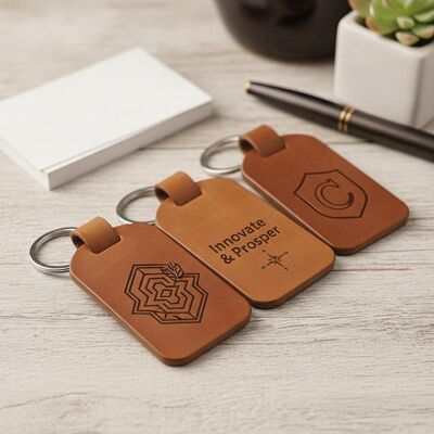 Prezzo buono Logo inciso con laser Tag chiave in pelle Design classico Ideale per il branding aziendale e gli accessori aziendali personalizzati in linea