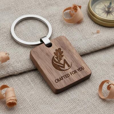 Prezzo buono Logo personalizzato portachiavi in legno incisione artigianato personalizzabile e anello di chiavi in metallo progettato per il marketing unico in linea