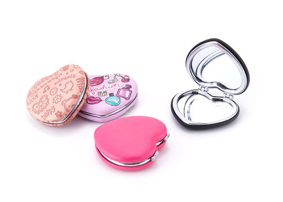 Prezzo buono Incidere lo specchio pieghevole di trucco dell'ABS cosmetico dello specchietto del cuore per il viaggio in linea